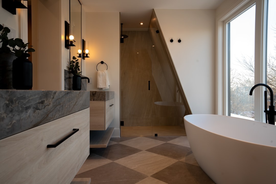Elegant bathroom with white bathtub